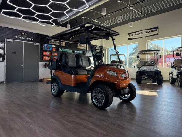 2023 Club Car Onward Gas 4 Passenger Golf Cart (Orange) at Oxford Golf Cars