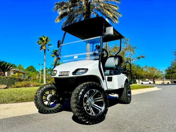 2017 E-Z-GO TXT 48V Lifted Electric 4 Passenger Golf Cart (White) at Oxford Golf Cars
