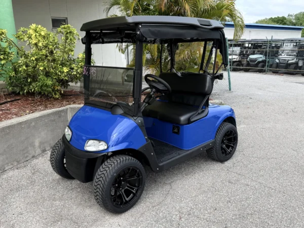 2020 E-Z-GO Freedom RXV Elite Lithium 2 Passenger Golf Cart (Blue, Black Seats, Rain Enclosure) at Oxford Golf Cars