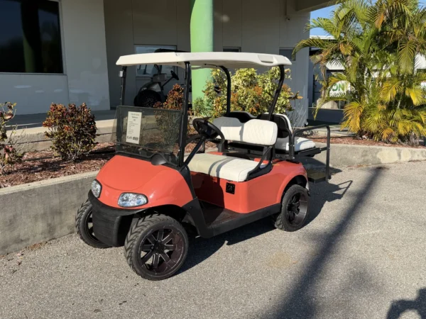 2020 E-Z-GO Freedom RXV Elite Lithium 4 Passenger Golf Cart (Salmon, White Roof) at Oxford Golf Cars