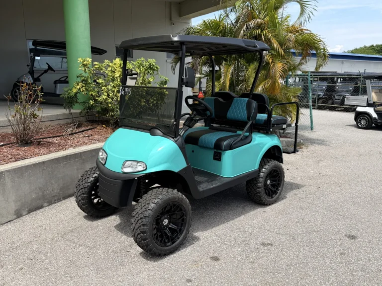 2020 E-Z-GO Freedom RXV Elite Lifted Lithium 4 Passenger Golf Cart (Turquoise) at Oxford Golf Cars