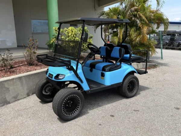 2020 E-Z-GO Freedom TXT Lifted Blue Cell Lithium 4 Passenger Golf Cart (Sky Blue) at Oxford Golf Cars