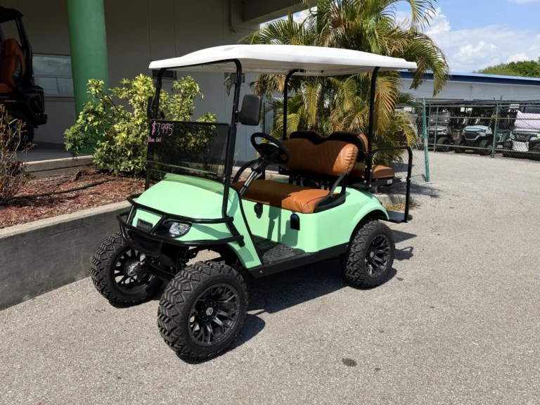 2022 E-Z-GO Freedom TXT Elite Lifted Lithium 4 Passenger Golf Cart (Aqua) at Oxford Golf Cars