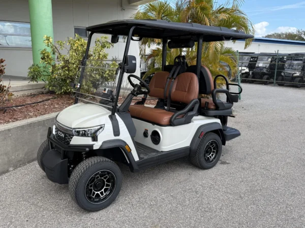 2026 ICON i40X Lifted Lithium 4 Passenger Golf Cart (White with Saddle Brown Seats) at Oxford Golf Cars